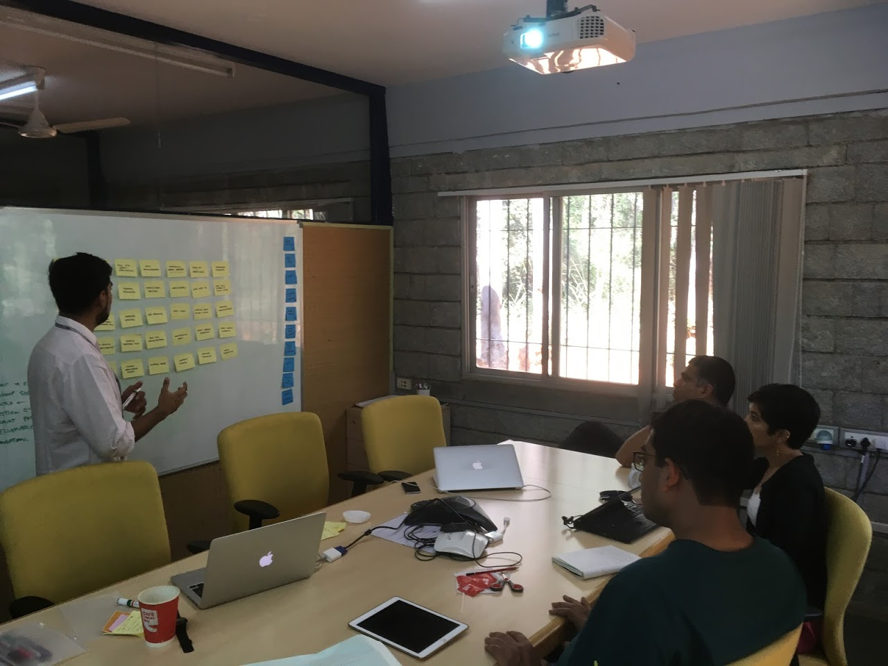 Prateek explaining feature cards