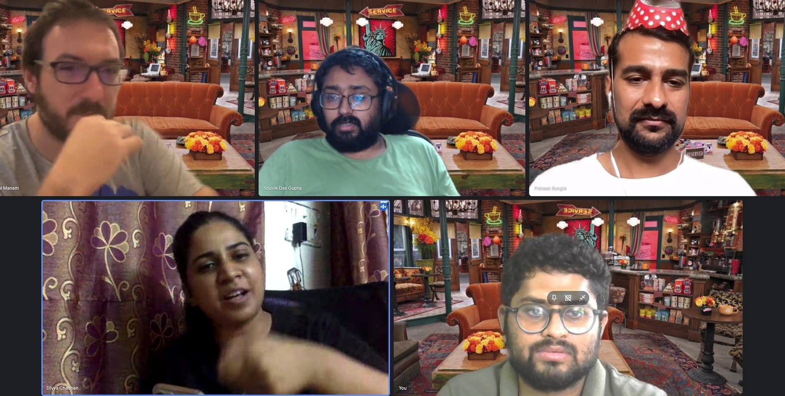 Team meeting using Cafe Perk from the TV show Friends as the backdrop